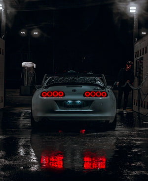 White Toyota Supra MK4 at Night Car Wash with Red Taillights Reflection HD phone wallpaper