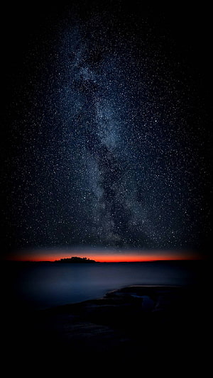 Milky Way Galaxy Over Ocean Horizon With Red Sunset Glow And Starry Night Sky HD phone wallpaper