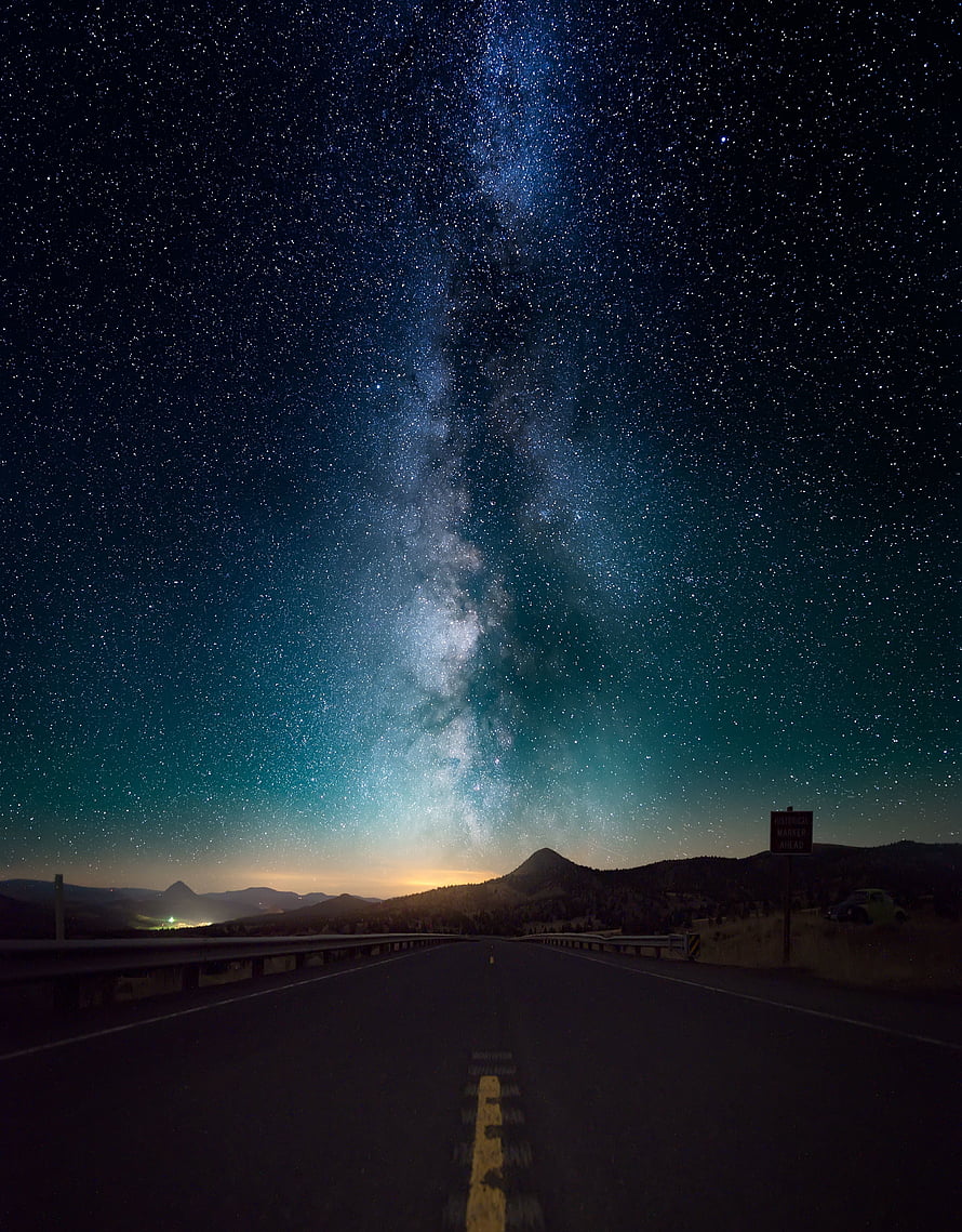 Milky Way Galaxy Arching Over a Desert Highway at Night HD phone wallpaper