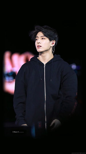 Stunning Portrait of K-Pop Idol in Black Zip-Up Hoodie on Stage HD phone wallpaper