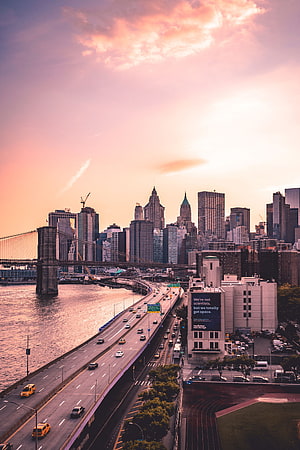 Manhattan Bridge and Lower Manhattan Skyline at Golden Hour with FDR Drive Traffic HD phone wallpaper