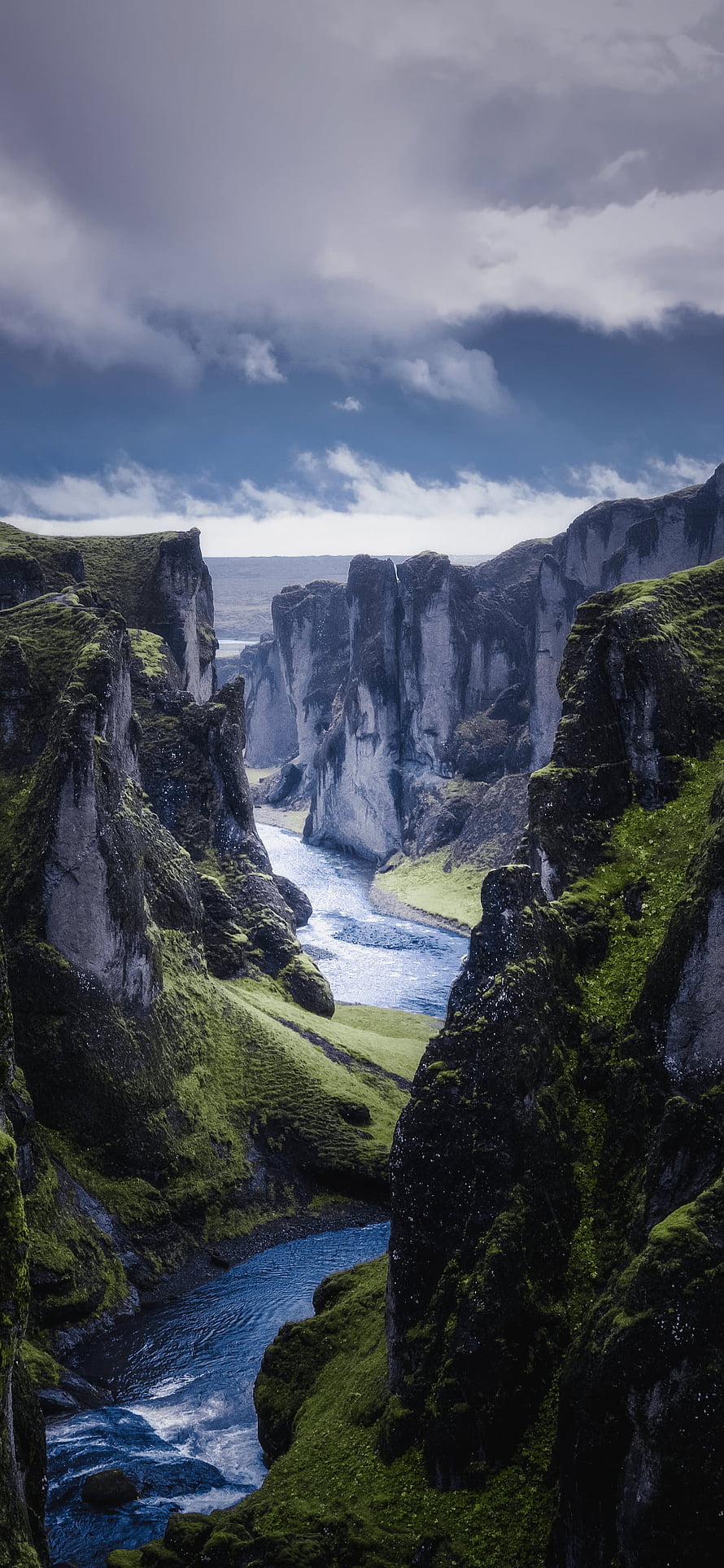 Stunning View of Fjaðrárgljúfur Canyon in Iceland with Mossy Cliffs and River HD phone wallpaper