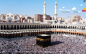 Aerial View of the Kaaba in Mecca Surrounded by Millions of Pilgrims During Hajj HD wallpaper