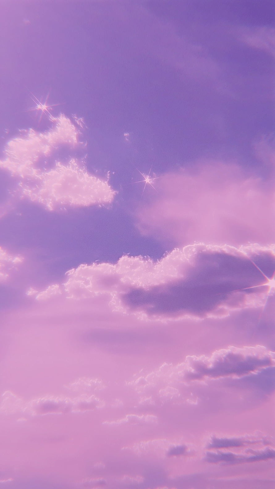 Dreamy Purple Sky With Fluffy Clouds And Sparkling Starbursts HD phone wallpaper