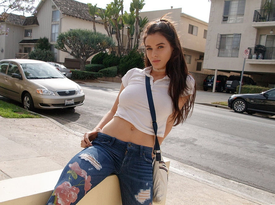 Lana Rhoades in White Crop Top and Floral Denim Jeans on a Sunny Residential Street HD wallpaper