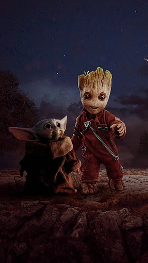 Baby Yoda and Baby Groot Standing Together on a Rocky Outcrop Under a Starry Night Sky HD phone wallpaper