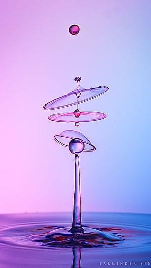 Abstract Water Drop Splash Photography with Purple and Blue Gradient Background HD phone wallpaper