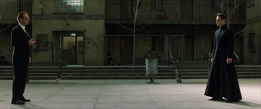 The Matrix Movie Scene with Neo and Agent Smith in the Courtyard HD wallpaper
