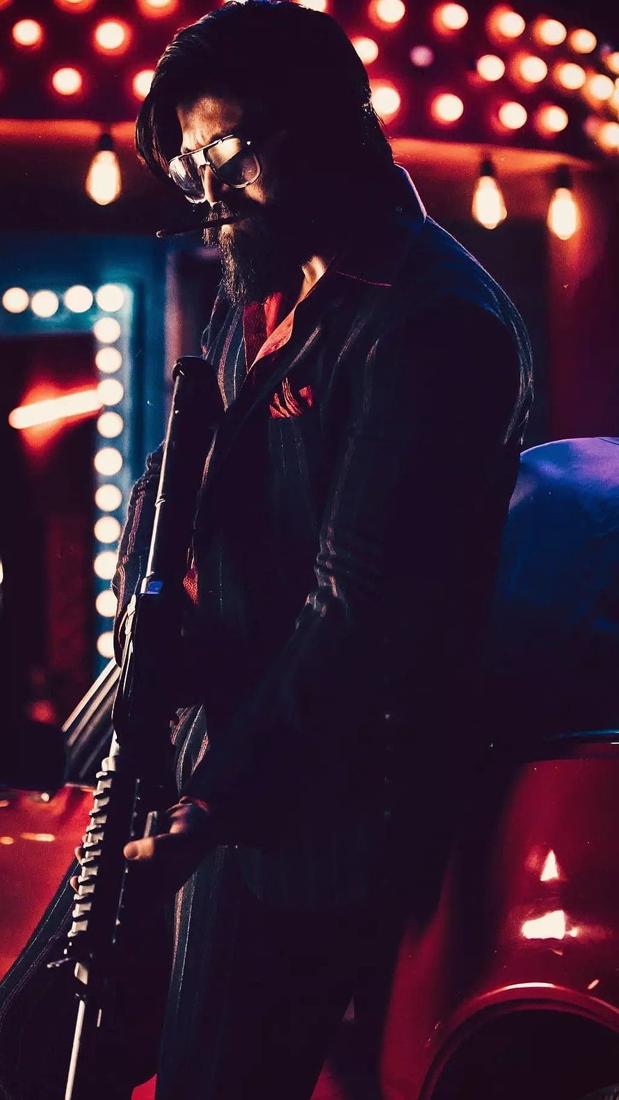 Man with beard and sunglasses holding rifle in neon lit bar scene, Yash, kgf, rocky bhai HD phone wallpaper