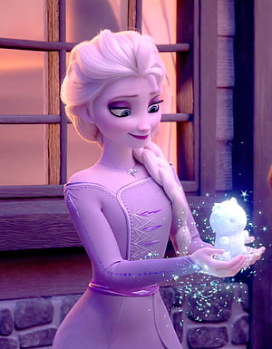 Elsa from Frozen in a lavender gown holding a glowing ice figurine with sparkling magical effects HD phone wallpaper