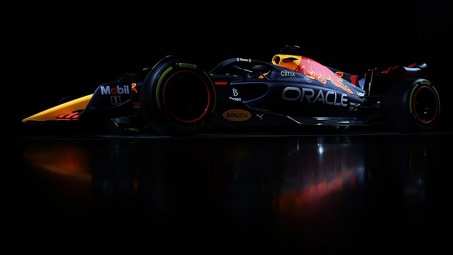 Red Bull Racing Oracle Formula One Car on Dark Reflective Surface HD wallpaper