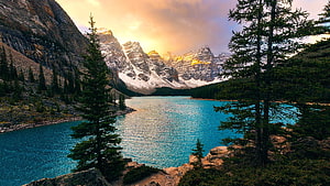 Moraine Lake at Golden Hour in Banff National Park with Turquoise Waters and Snowy Peaks HD wallpaper