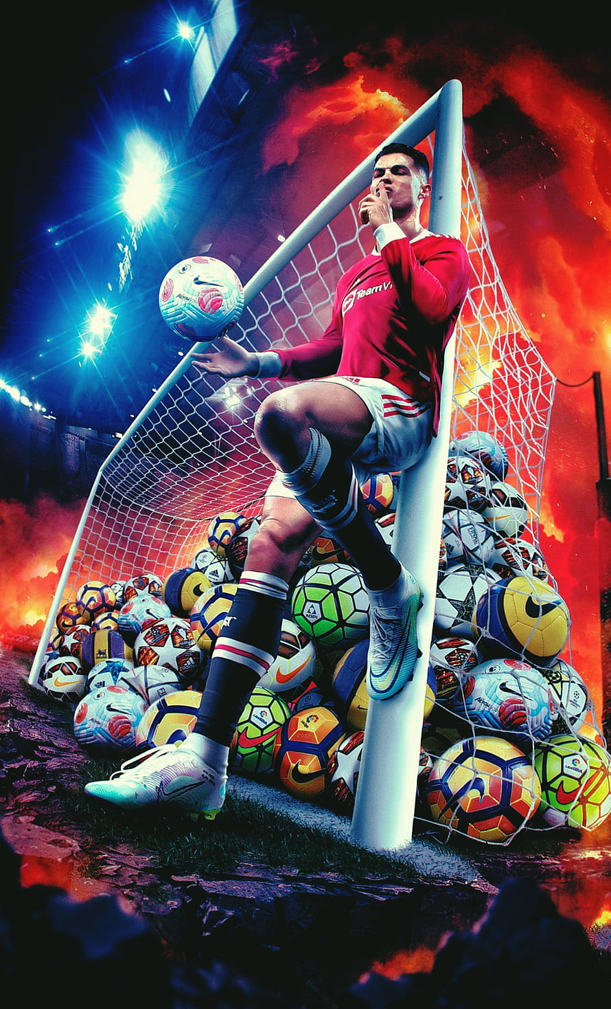 Cristiano Ronaldo sitting on a goalpost surrounded by a pile of soccer balls in a dramatic stadium setting HD phone wallpaper