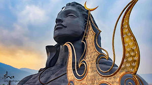 Adiyogi Shiva Statue at Isha Yoga Center with Golden Trishul and Serene Expression HD wallpaper