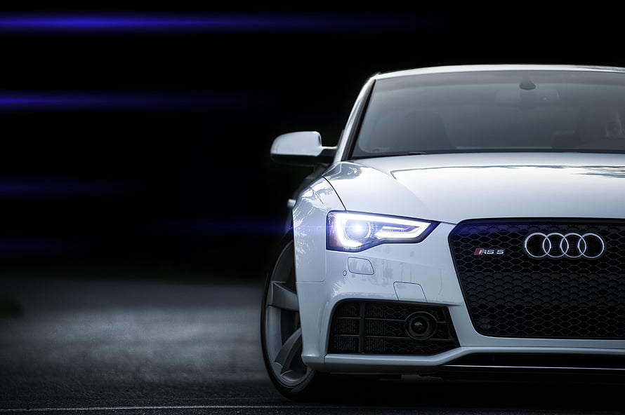 Audi RS5 Front Fascia Close-Up with LED Headlights and Signature Grille HD wallpaper