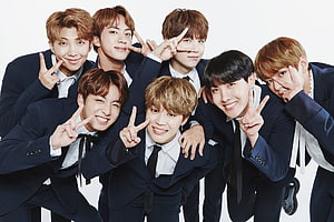 BTS Members in Navy Suits Making Peace Signs Against White Background HD wallpaper