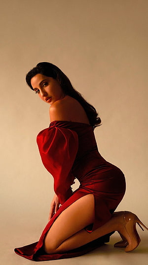 Woman in Elegant Red Off-Shoulder Dress with High Slit and Nude Heels, Nora fatehi, bollywood actress HD phone wallpaper