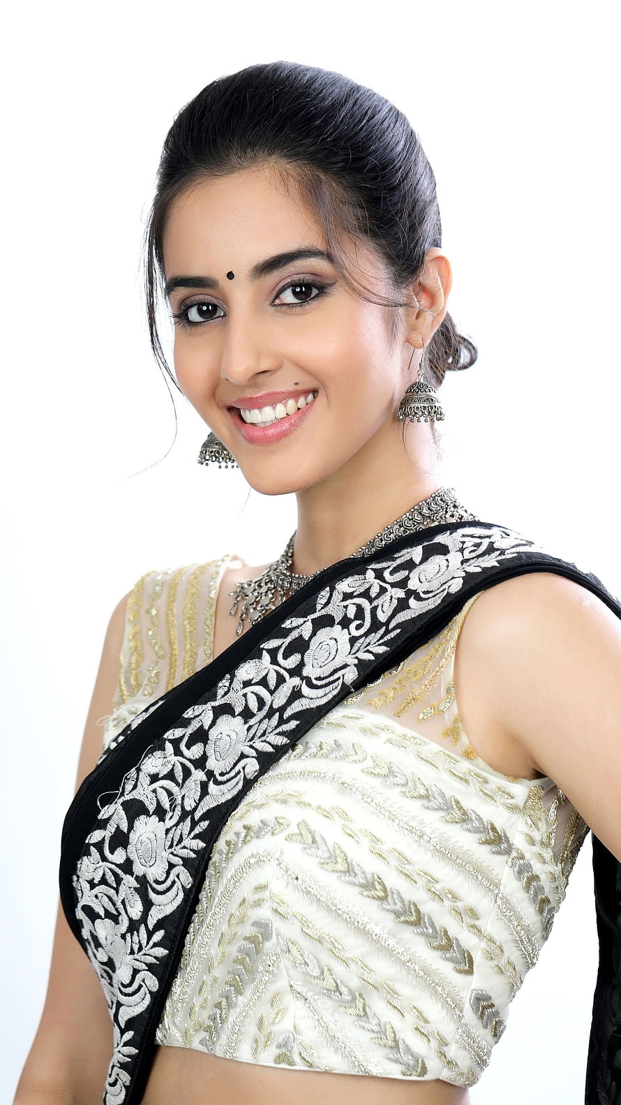 Simrat Kaur in an elegant white and gold embroidered blouse with a black floral saree border HD phone wallpaper