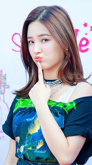 Kim Lip from Loona posing with a finger to her lips in a graphic t-shirt HD phone wallpaper