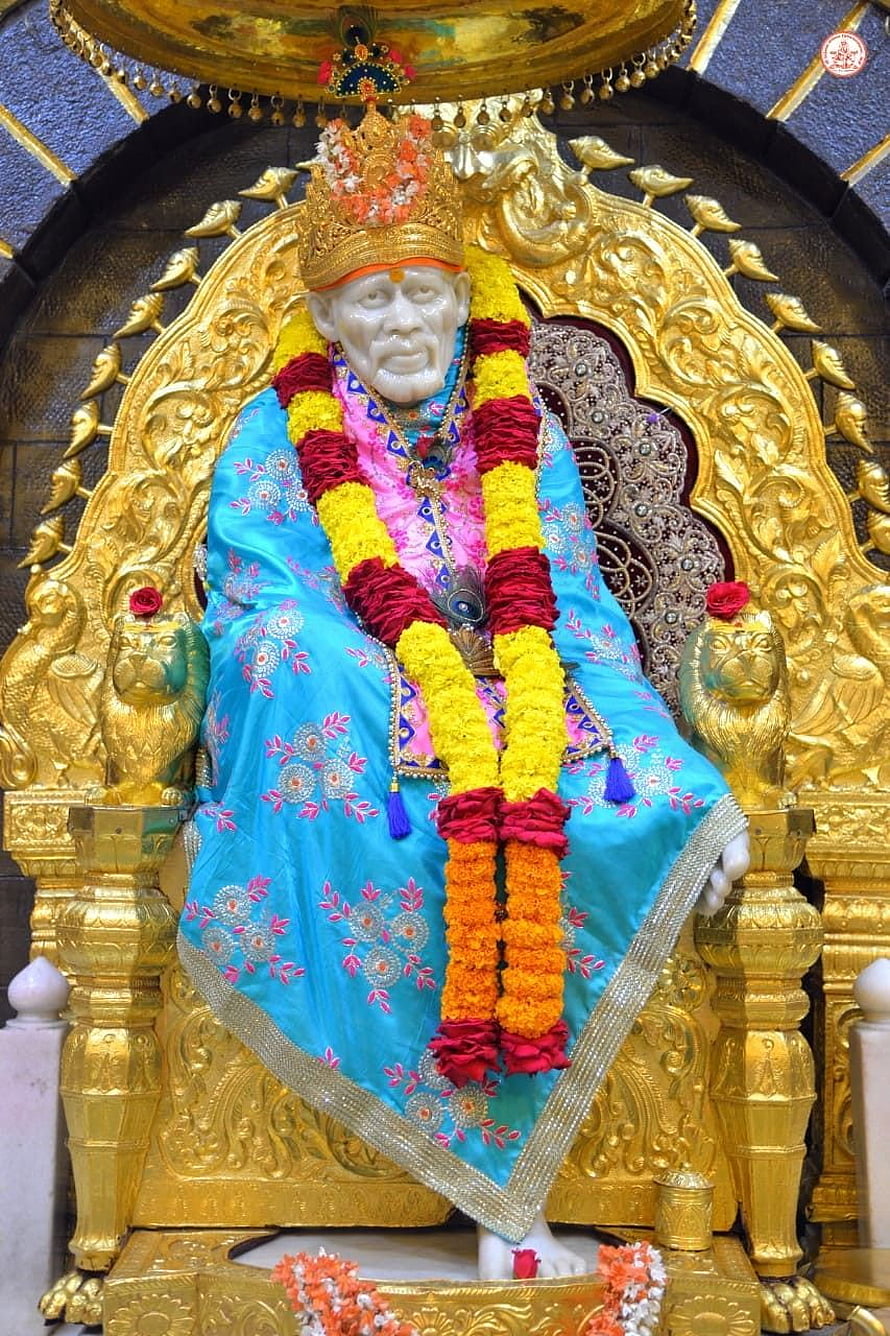 Sri Sathya Sai Baba Statue Seated on Golden Throne with Flower Garlands HD phone wallpaper