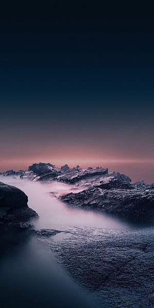 Misty Rocky Mountain Landscape at Twilight with Soft Pink and Blue Sky Gradient HD phone wallpaper