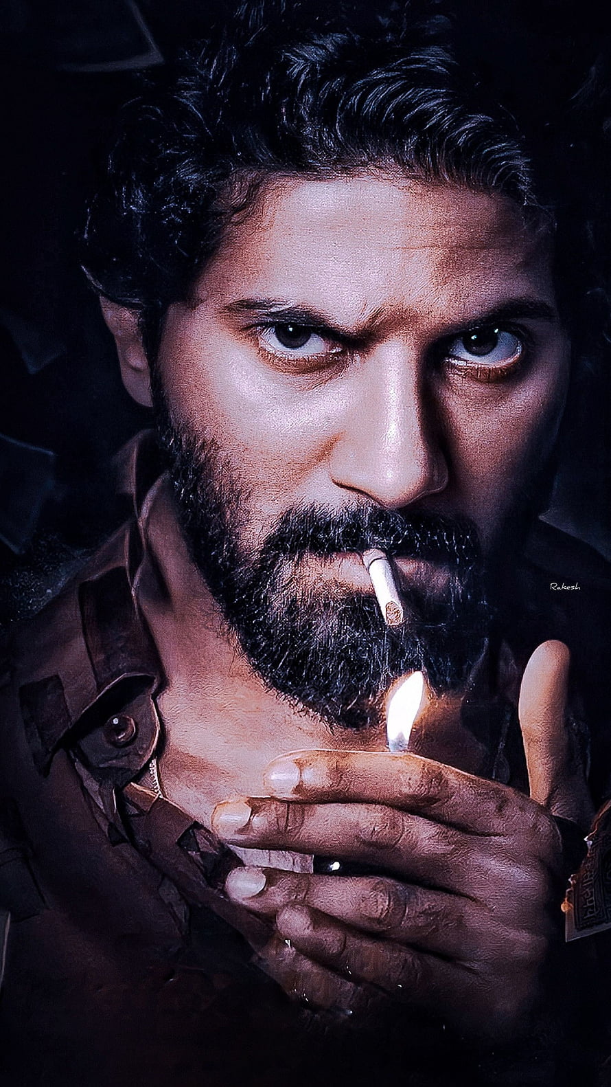 Dulquer Salmaan Intense Close-Up Portrait Lighting a Cigarette in Dark Cinematic Style HD phone wallpaper