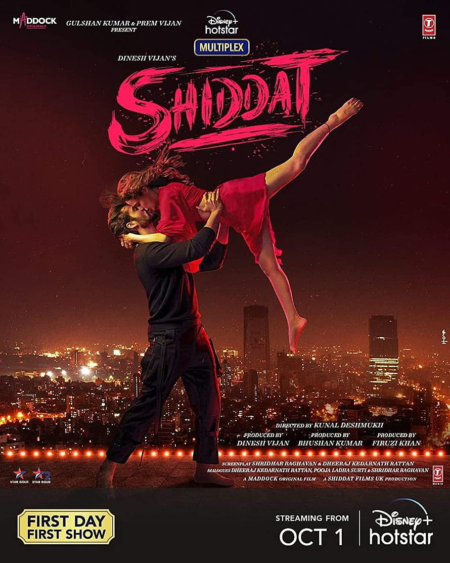 Shiddat movie poster featuring a couple in a dramatic dance lift against a city skyline at night HD phone wallpaper