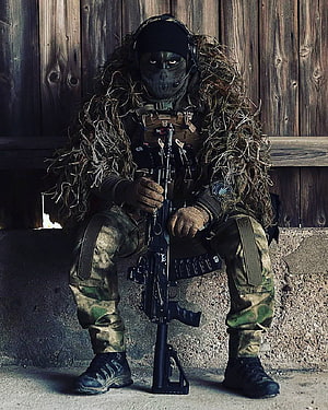 Sniper in Ghillie Suit with Tactical Rifle and Camouflage Gear HD phone wallpaper