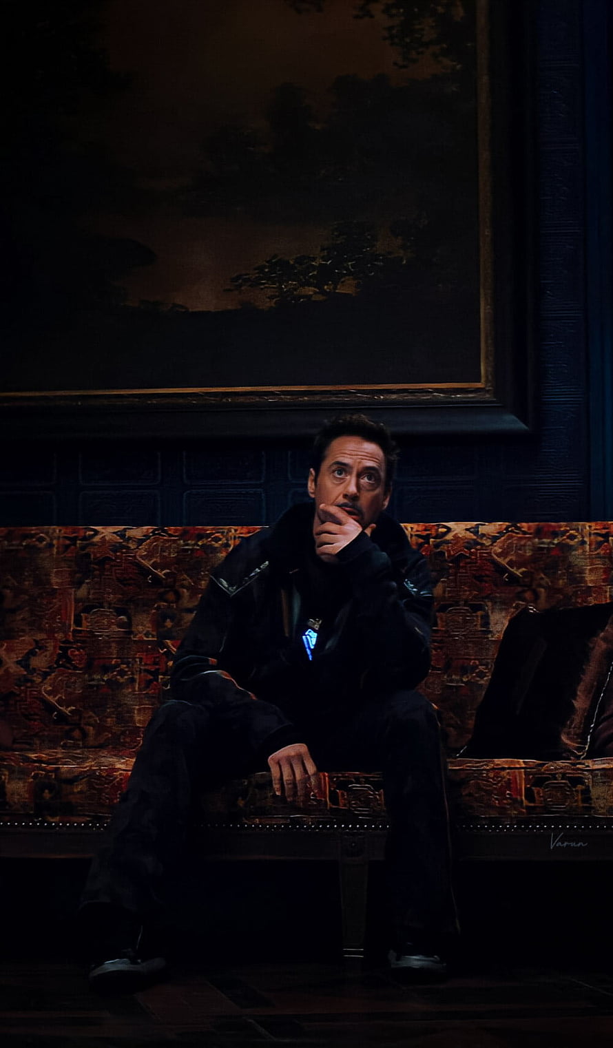 Tony Stark Sitting on Sofa in Dark Room with Arc Reactor Glowing HD phone wallpaper
