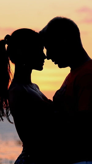 Romantic Couple Silhouette Foreheads Together at Golden Sunset HD phone wallpaper