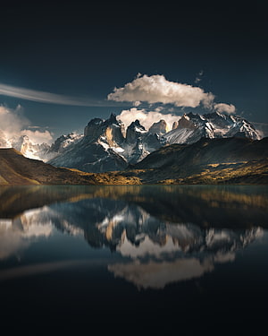 Torres del Paine Mountain Range Reflected in a Calm Lake at Dusk in Chile HD phone wallpaper