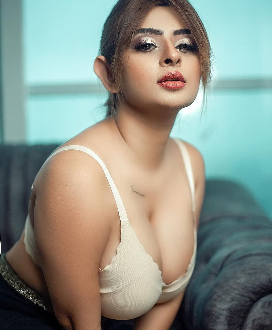 Ankita Dave Portrait in White Bra with Soft Teal Background HD phone wallpaper