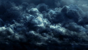 Dark Blue Storm Clouds Aesthetic Sky with Dramatic Lighting and Moody Atmosphere HD wallpaper