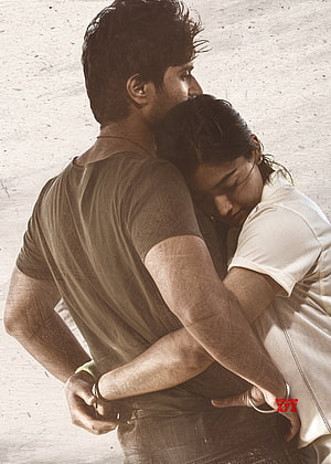 Vijay Devarakonda and Rashmika in an emotional embrace from the film Dear Comrade HD phone wallpaper
