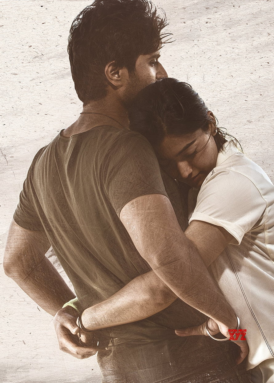 Vijay Devarakonda and Rashmika in an emotional embrace from the film Dear Comrade HD phone wallpaper