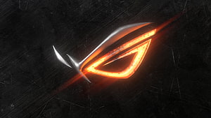 Glowing ASUS ROG Eye Logo on Dark Textured Background HD wallpaper