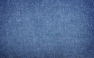 Close-Up Denim Fabric Texture With Woven Blue Thread Pattern HD wallpaper