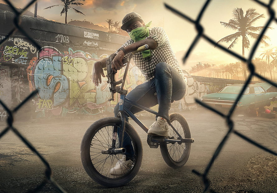 Urban BMX Rider on Bike in Graffiti Alley at Sunset HD wallpaper