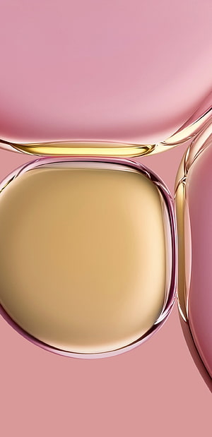 Abstract 3D Render of Glossy Gold and Pink Liquid Bubbles on a Soft Rose Background HD phone wallpaper