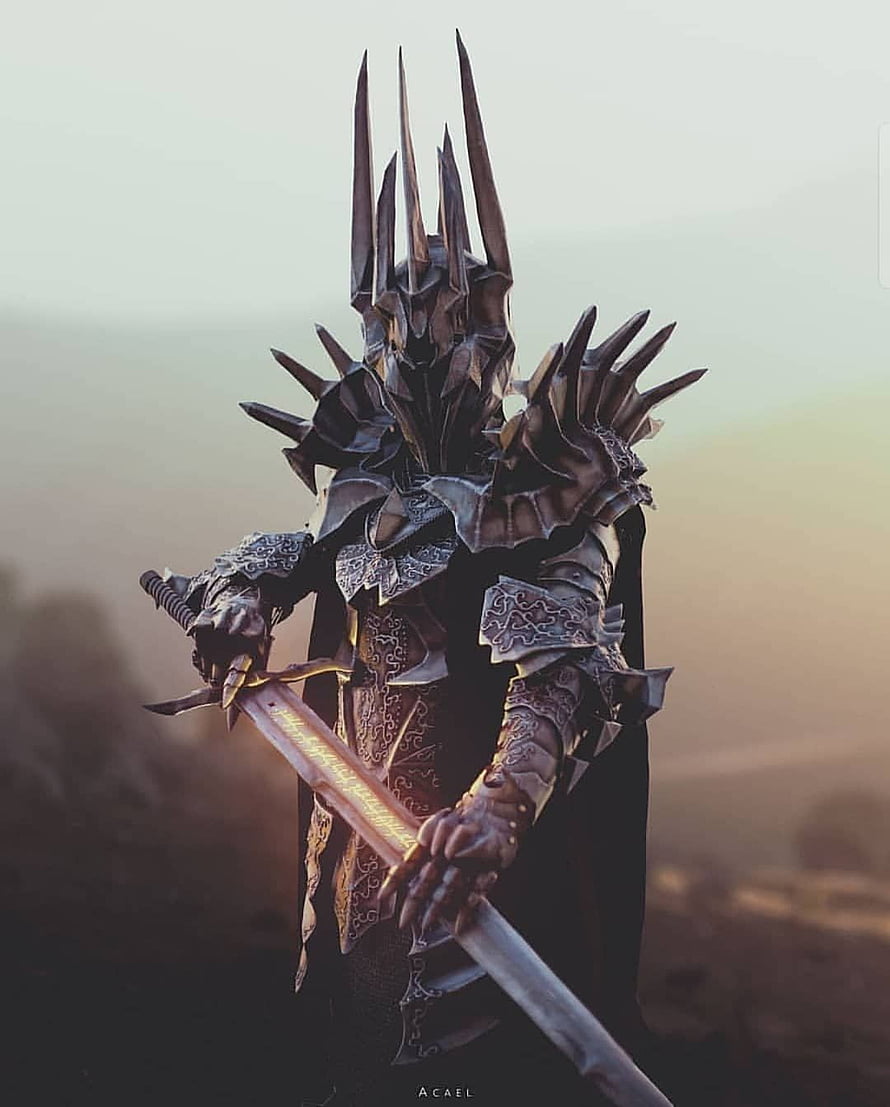 Sauron Lord of the Rings Dark Lord in Spiked Armor Holding a Glowing Sword HD phone wallpaper