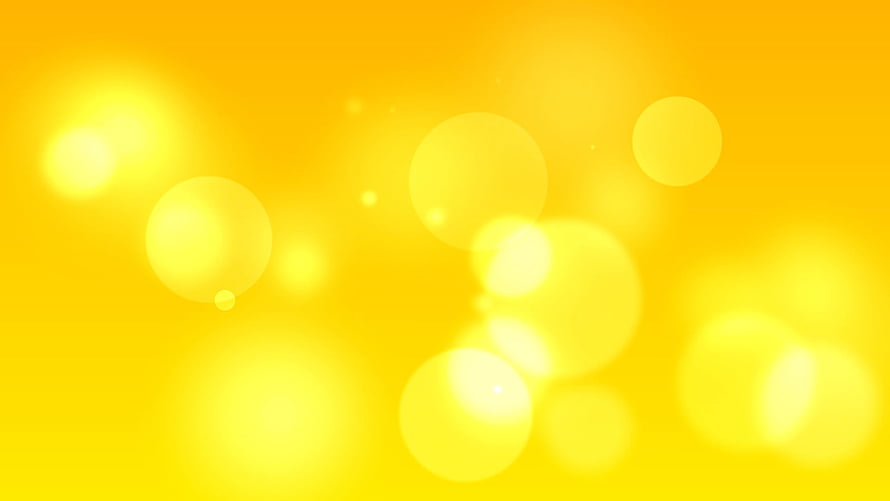 Abstract Yellow Bokeh Background With Soft Glowing Light Circles HD wallpaper
