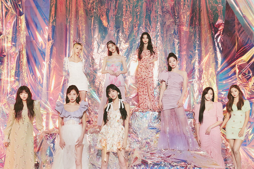 Twice Members in Pastel Dresses Against Iridescent Metallic Backdrop HD wallpaper