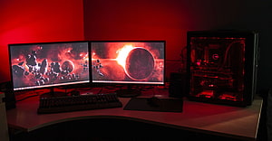 Red LED Gaming PC Setup With Dual Monitors Displaying Space Wallpaper HD wallpaper