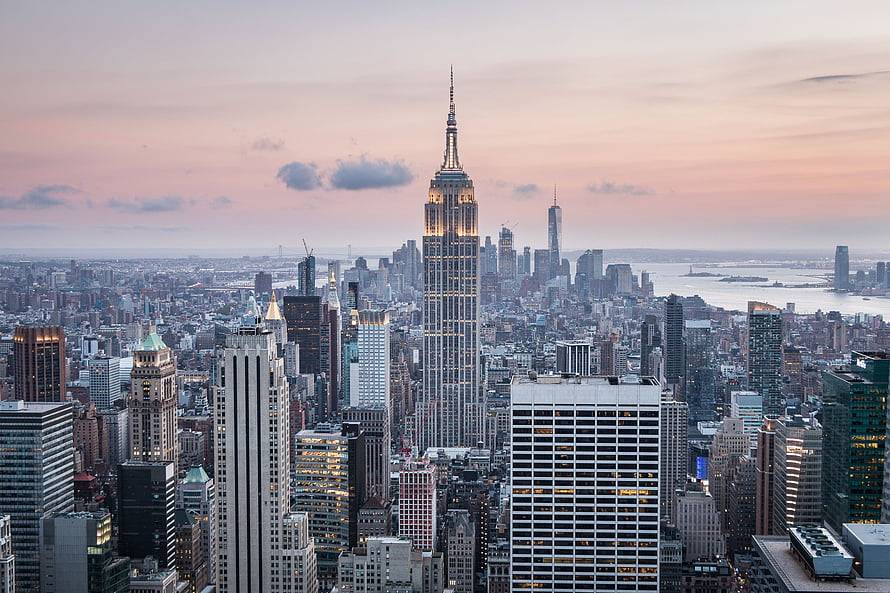 Aerial View of New York City Skyline Featuring the Empire State Building at Sunset HD wallpaper