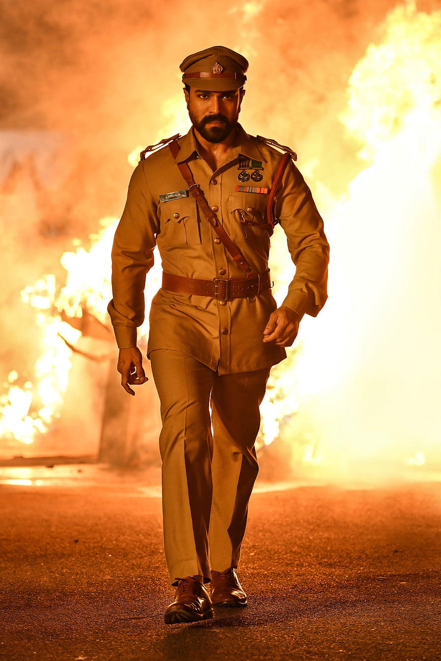 Indian Police Officer Walking Through Fire in Khaki Uniform HD phone wallpaper