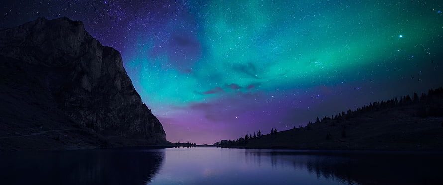 Stunning Aurora Borealis Over Mountain Lake With Starry Night Sky Reflection HD wallpaper