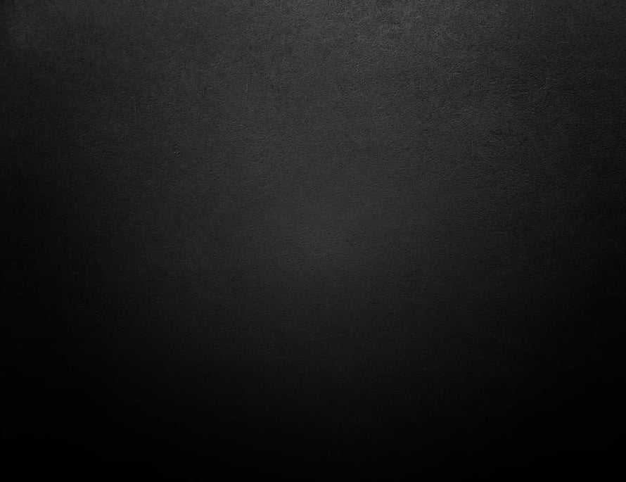 Dark Charcoal Gradient Texture with Subtle Surface Grain and Vignette HD wallpaper