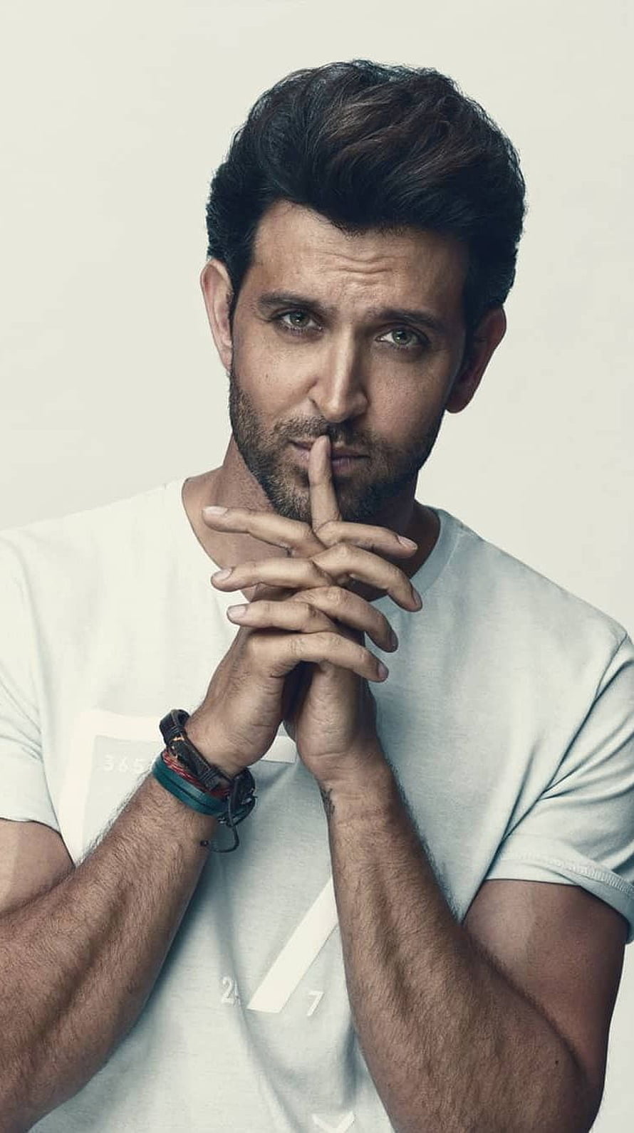 Hrithik Roshan Portrait in White T-Shirt with Finger on Lips HD phone wallpaper