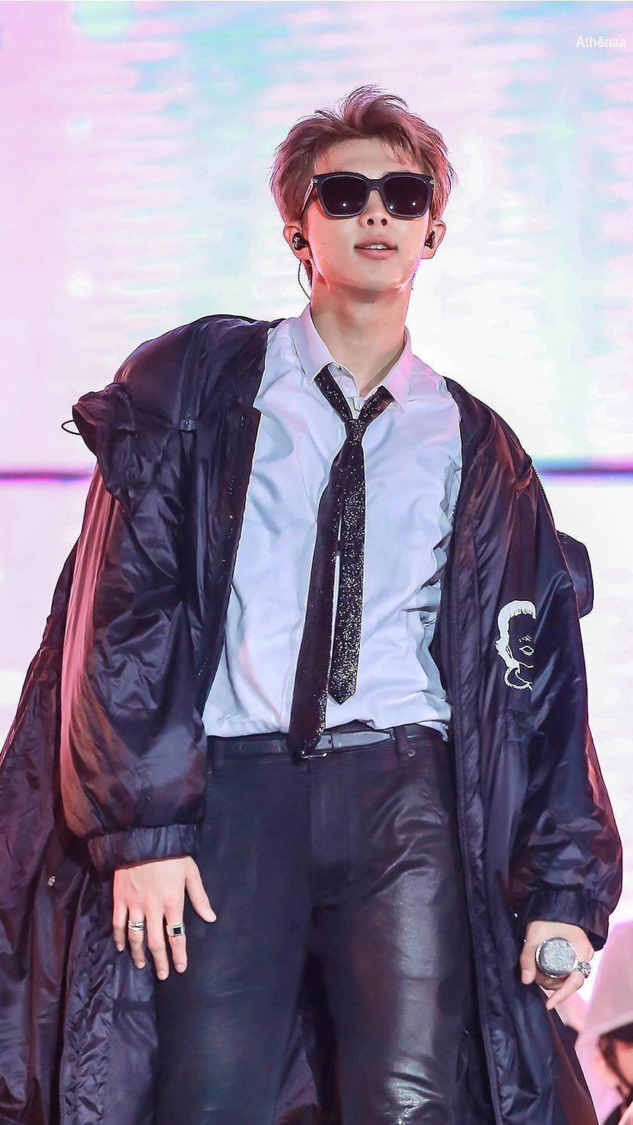 RM from BTS in a black bomber jacket, white shirt, and sunglasses on stage HD phone wallpaper