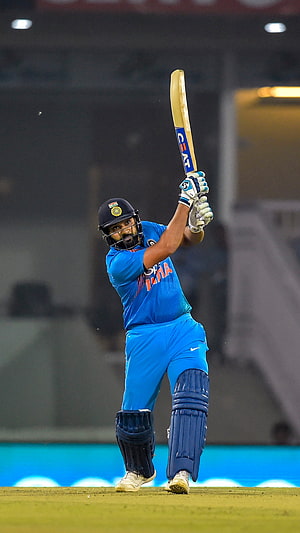 Virat Kohli Playing Cricket in Blue India Jersey HD phone wallpaper